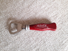 APRIBOTTIGLIE LEVATAPPI COCA