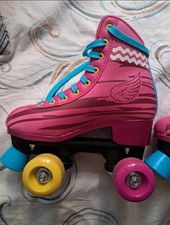 pattini 4 ruote taglia 34/35 colore fucsia formati Roces