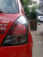FANALI FARI FUME' POSTERIORI A LED SUZUKI SWIFT MZ DAL 2005 AL 2010