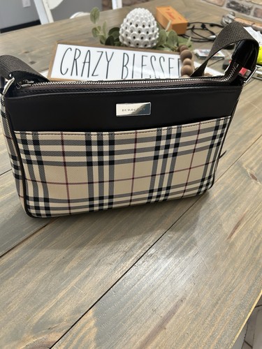 Burberry crossbody barely used - barely,