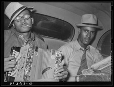 8" x 10" Photo Negro musicians playing accordion and washboard in automobile.