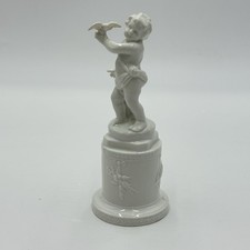 Antica statuina porcellana