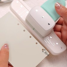 Perforatrice A 3 Fori