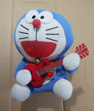 Pupazzo peluche Doraemon con chitarra