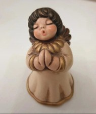 THUN angioletto che prega con