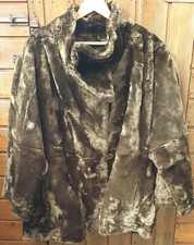 pelliccia montone vintage donna con bottoni in ambra