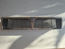 GRIGLIA MASCHERINA ANTERIORE RADIATORE LANCIA PRISMA LANCIA 630834100 Originale 
