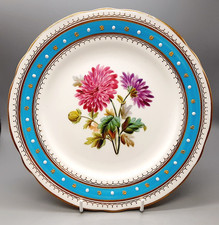 Antico piatto floreale bordato