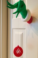 Braccio del Grinch con Pallina