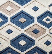 Tappeto trapuntato a mano