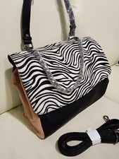 Borsa pelle e simil cavallino