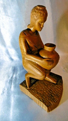 Scultura donna con - donna,