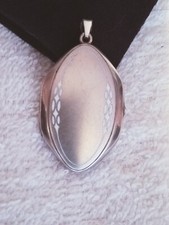 Medaglione Alpacca leggermente