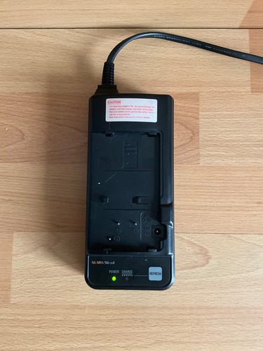Caricabatteria per videocamera