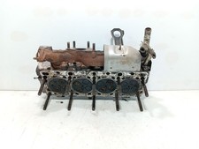 R2AA10090E TESTATA MOTORE /