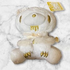 Peluche orso cupo posa seduta
