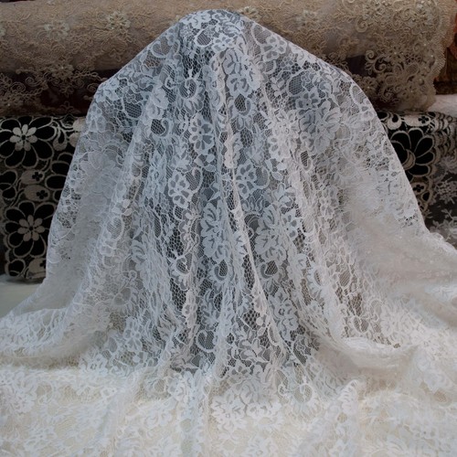 Tessuto pizzo cordato bianco