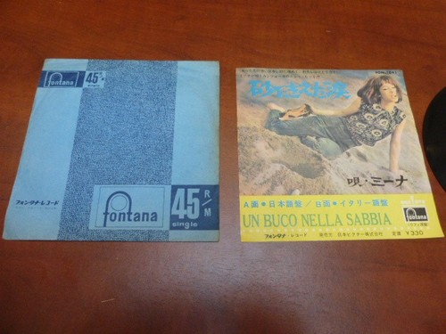 Mina buco nella sabbia - nella, sabbia"