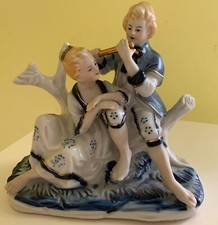 Statuina di porcellana di