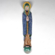 Statua da parete in ceramica