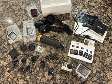 Action camera GoPro Hero 4 argento + pacchetto accessori impermeabili ufficiali