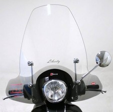 Windshield with attachments