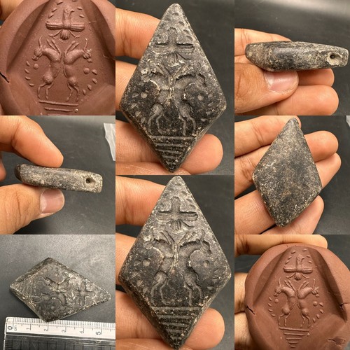 Antico ciondolo amuleto romano