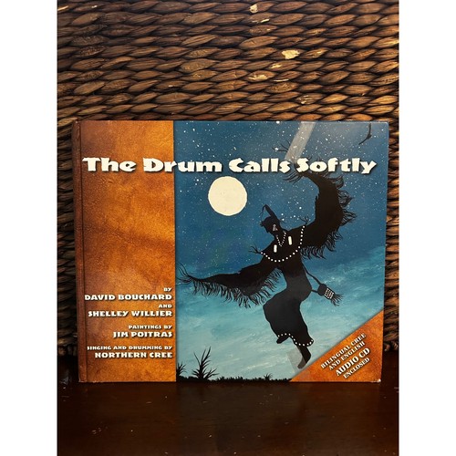 The drum calls - calls, softly