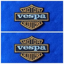 A Pair Of Vespa Scooter