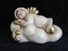 Thun statuina angelo su nuvola