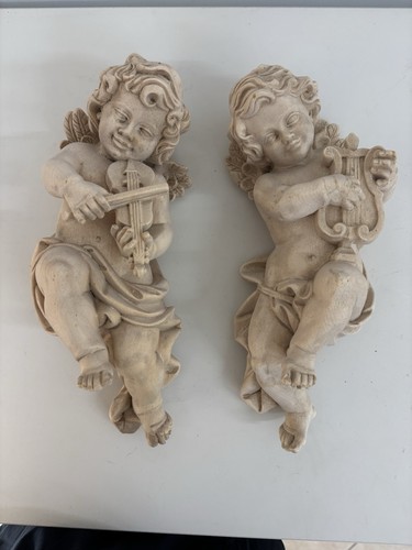 Coppia angeli con - di,