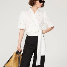 Top Munthe bianco avvolgente