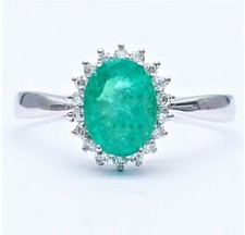 ANELLO IN ORO BIANCO 18kt. CON DIAMANTI NATURALI E SMERALDO NATURALE 1.52 CARATI