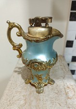 Antico accendino vasetto