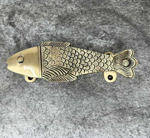 Maniglia pesce ottone - in,