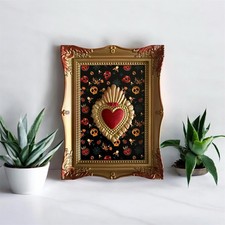 Cornice con cuore sacro