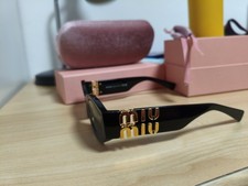Occhiali da sole donna MIU MIU