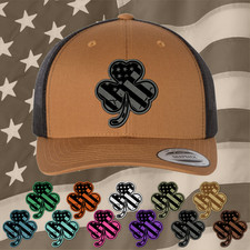 Cappelli con toppa in pelle