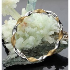 BRACCIALE DONNA RIGIDO IN ORO 18 KT