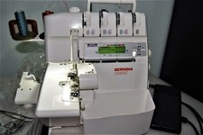MACCHINA TAGLIA E CUCI E DI COPERTURA BERNINA 1300DC CON GARANZIA!