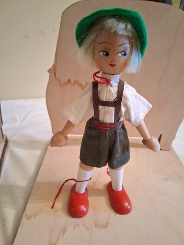 Bambola legno vedi - in,