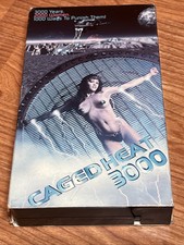 Caged heat 3000 vhs - caged,