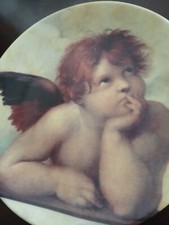 Piatto in porcellana cherubino