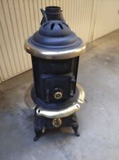 stufa a legna - parlor comfort 10 kw, usata, con rilievi in ottone.