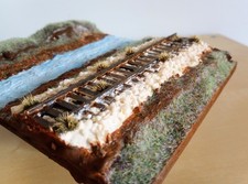 Diorama ferroviario con fiume
