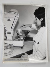 Woman weighs white rat - woman,