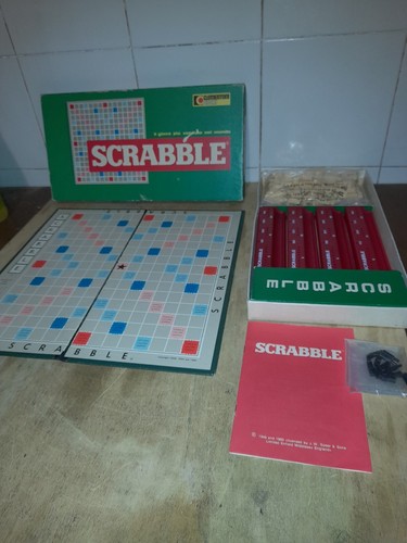 Scrabble scarabeo - /,