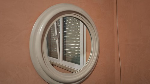 Specchio tondo con - , cornice