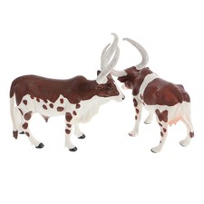 2 mucche giocattolo