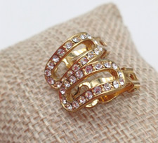 ORECCHINI CLIP - VINTAGE '80 METALLO DORATO E CURVA DI STRASS